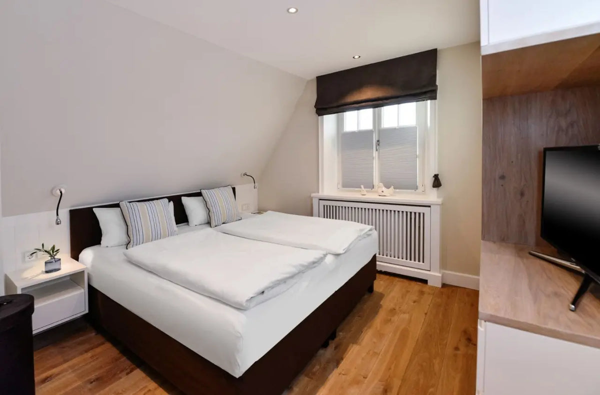 Reetdach-Ferienhaus mit Sauna in Morsum – Sylt